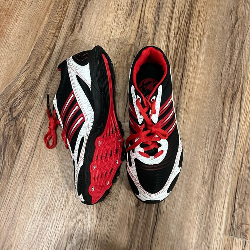 Size 7 1/2 addidas women’s running spikes
